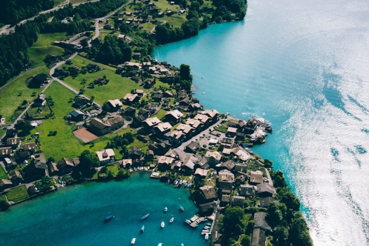 bird's eye view photography of boat on body of water