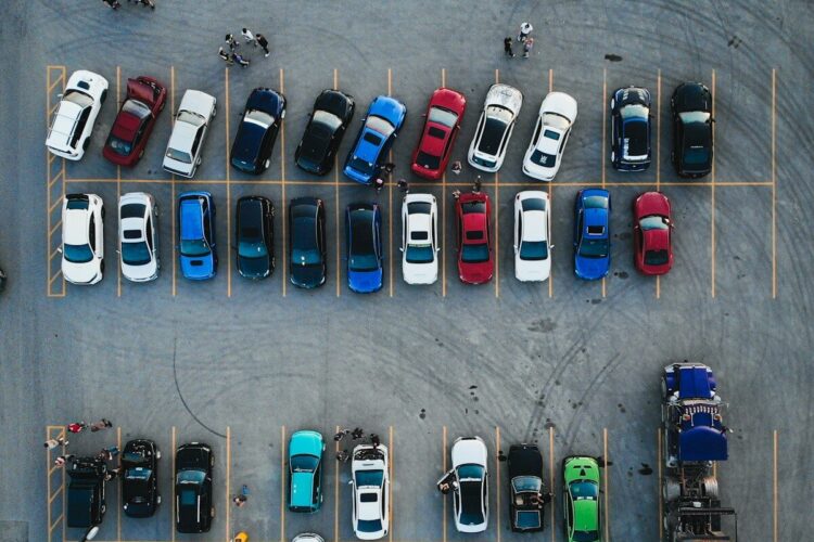 cars parked on parking lot during daytime